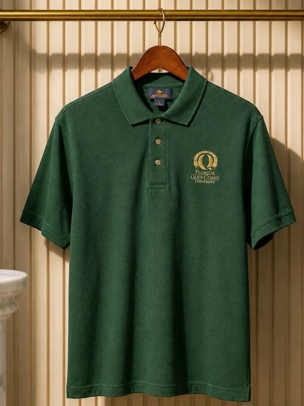 Men's Dark Green Polo with Gold FGCU Crest